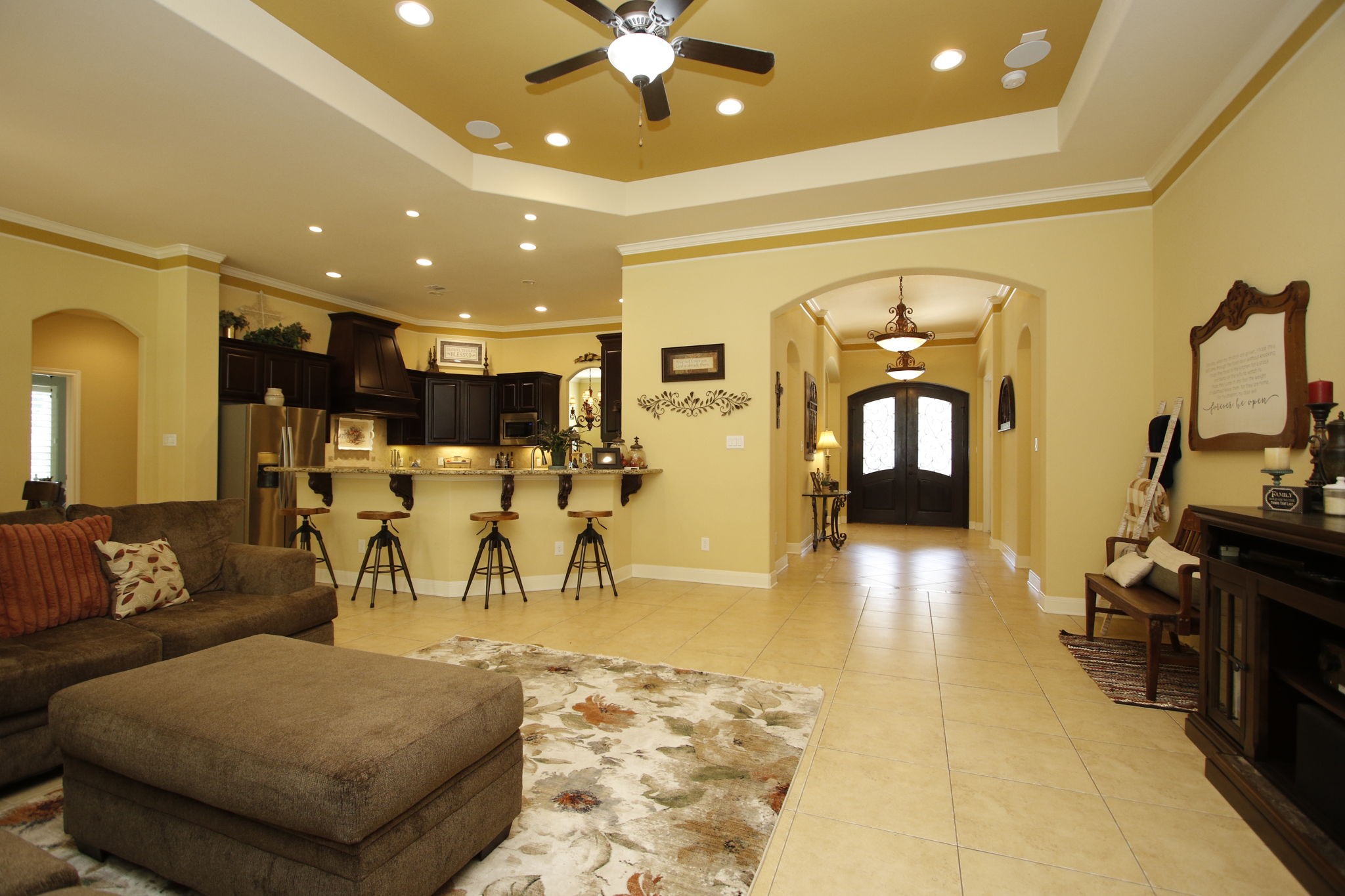 1547 Ruby Drive Willis, TX 77378 - Photo 13 of 48 a living room with furniture and a flat screen tv