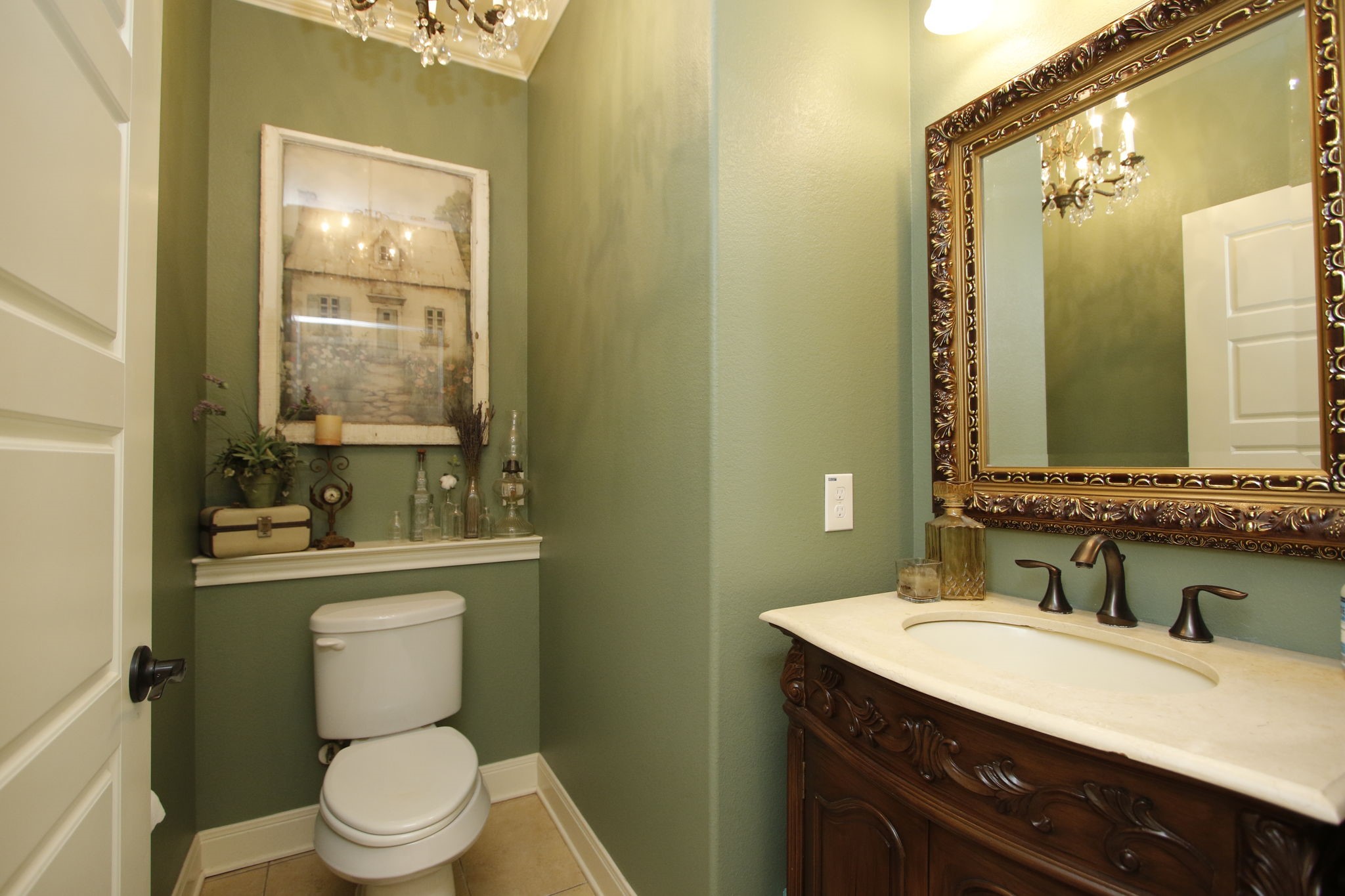 1547 Ruby Drive Willis, TX 77378 - Photo 19 of 48 a bathroom with a granite countertop toilet sink and mirror