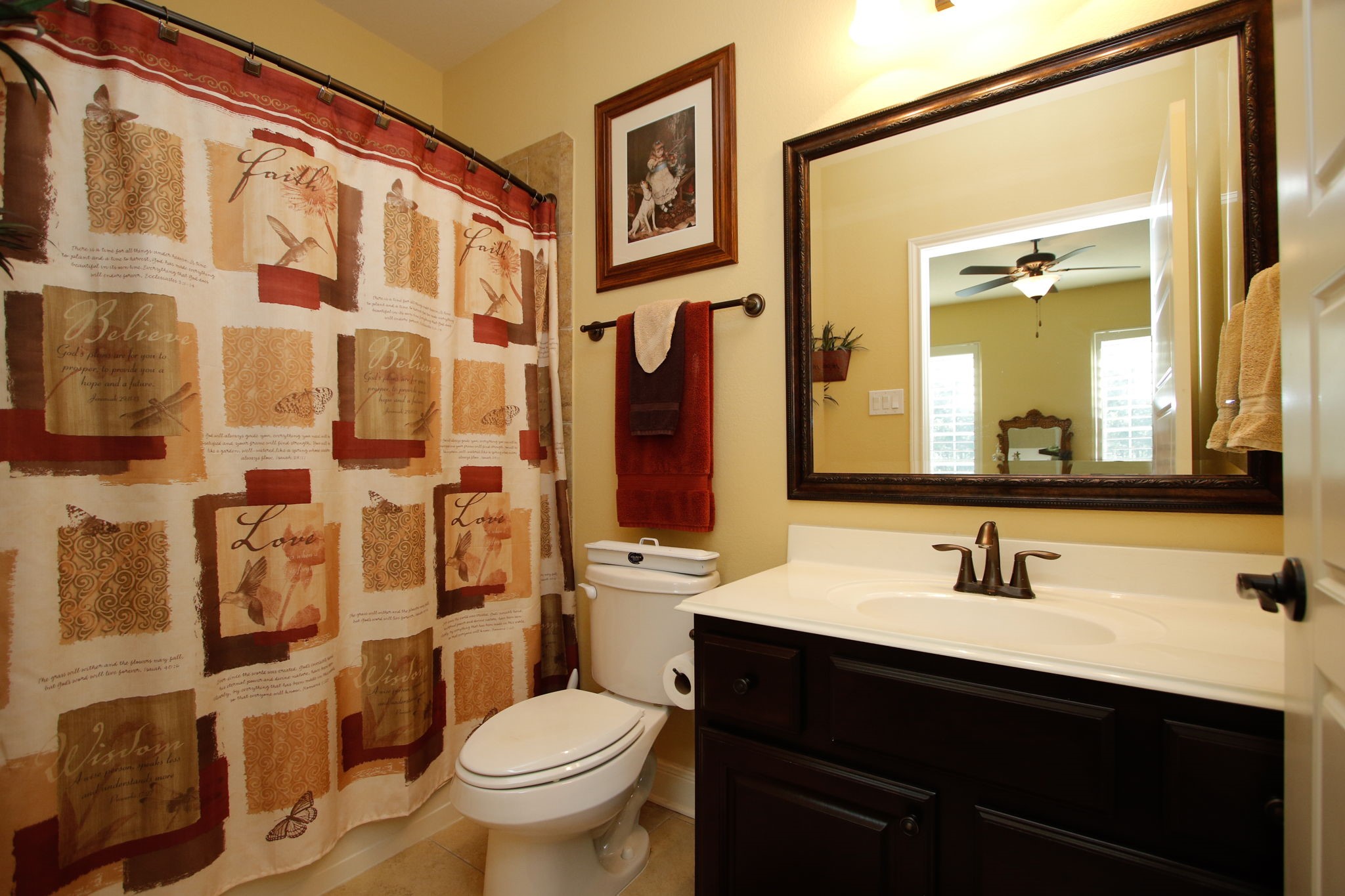 1547 Ruby Drive Willis, TX 77378 - Photo 22 of 48 a bathroom with a sink and a mirror