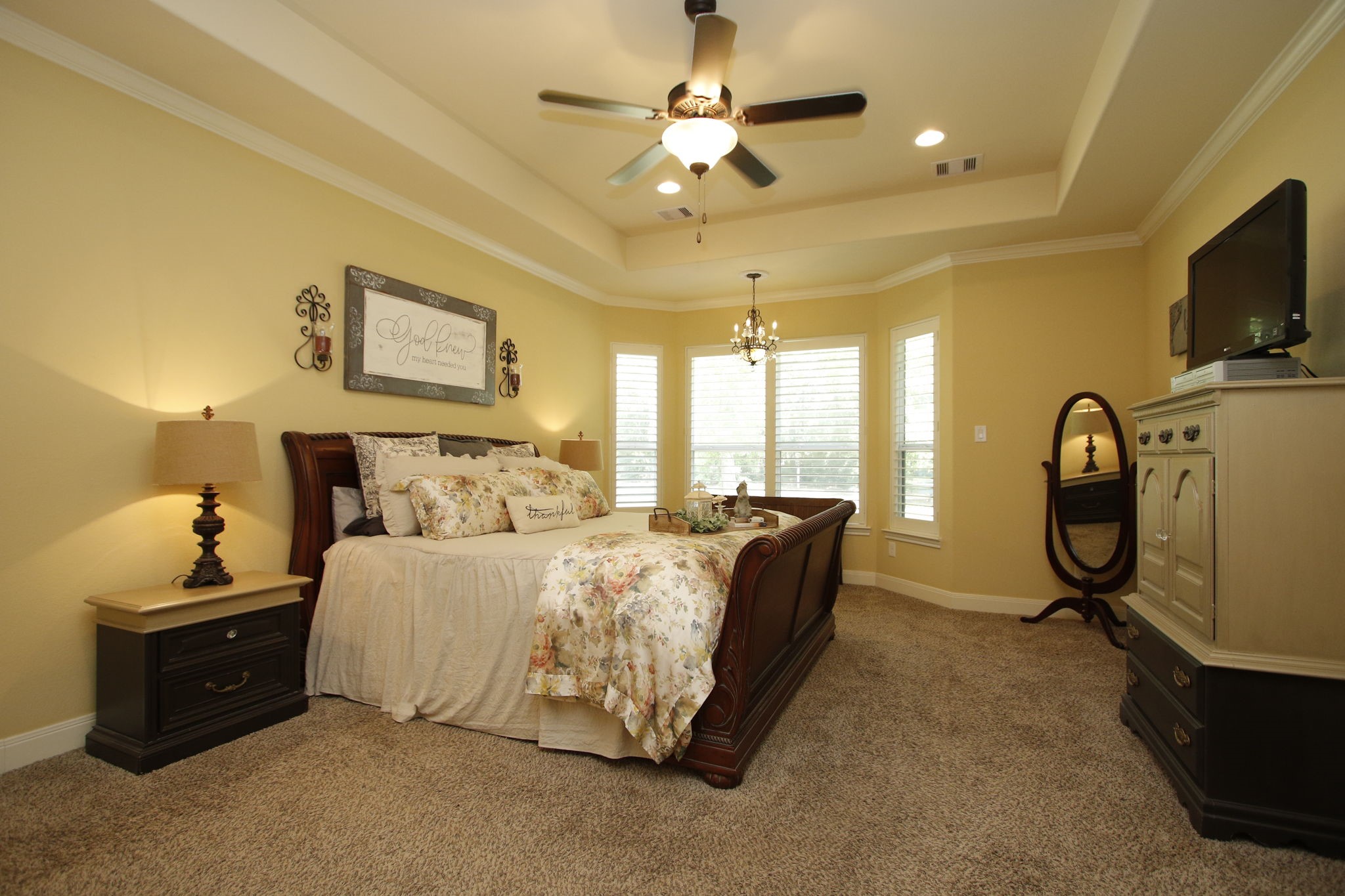 1547 Ruby Drive Willis, TX 77378 - Photo 23 of 48 a bed room with a bed furniture and a flat screen tv
