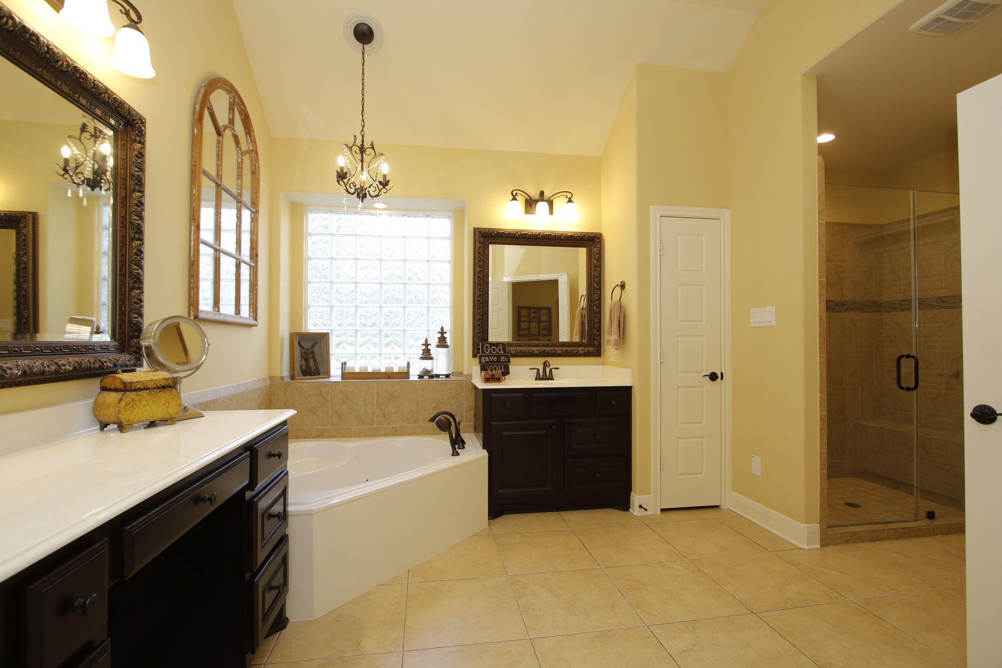 1547 Ruby Drive Willis, TX 77378 - Photo 27 of 48 a bathroom with a tub sink shower and mirror