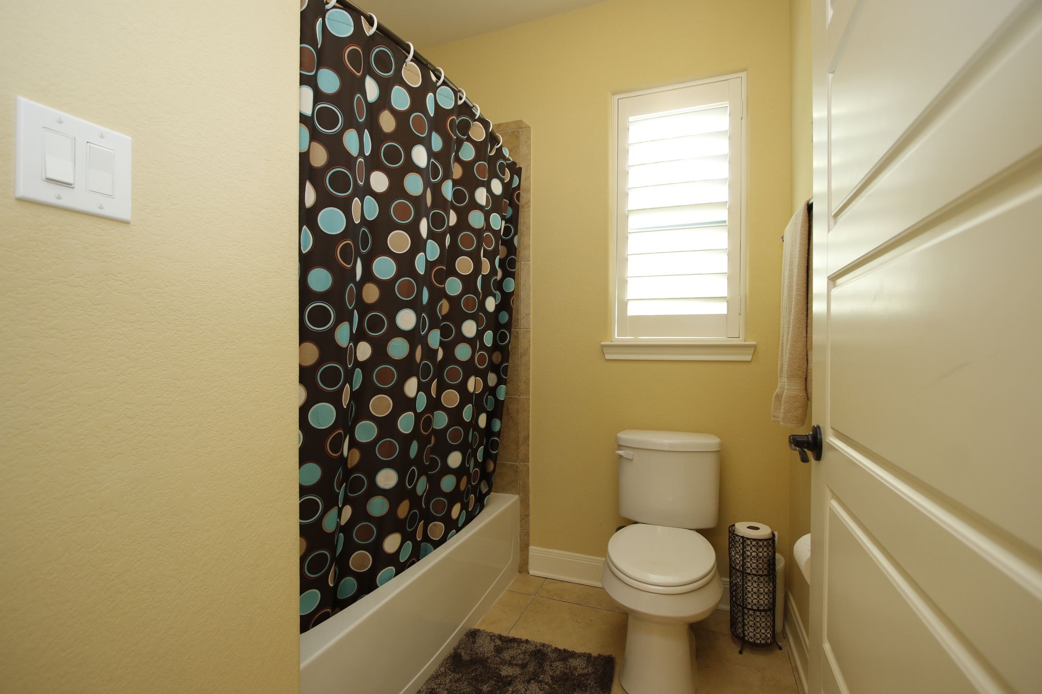 1547 Ruby Drive Willis, TX 77378 - Photo 32 of 48 a white toilet sitting next to a small sink