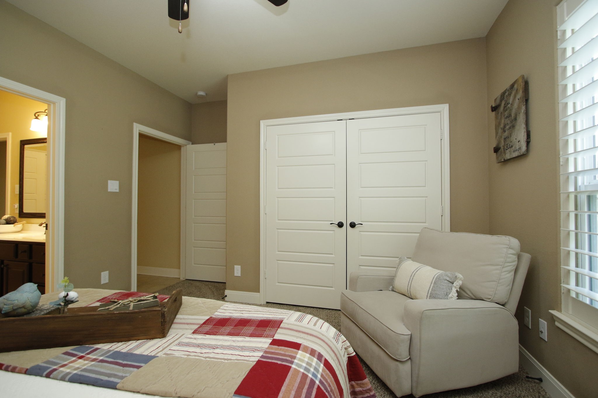 1547 Ruby Drive Willis, TX 77378 - Photo 35 of 48 a bedroom with a bed and a couch