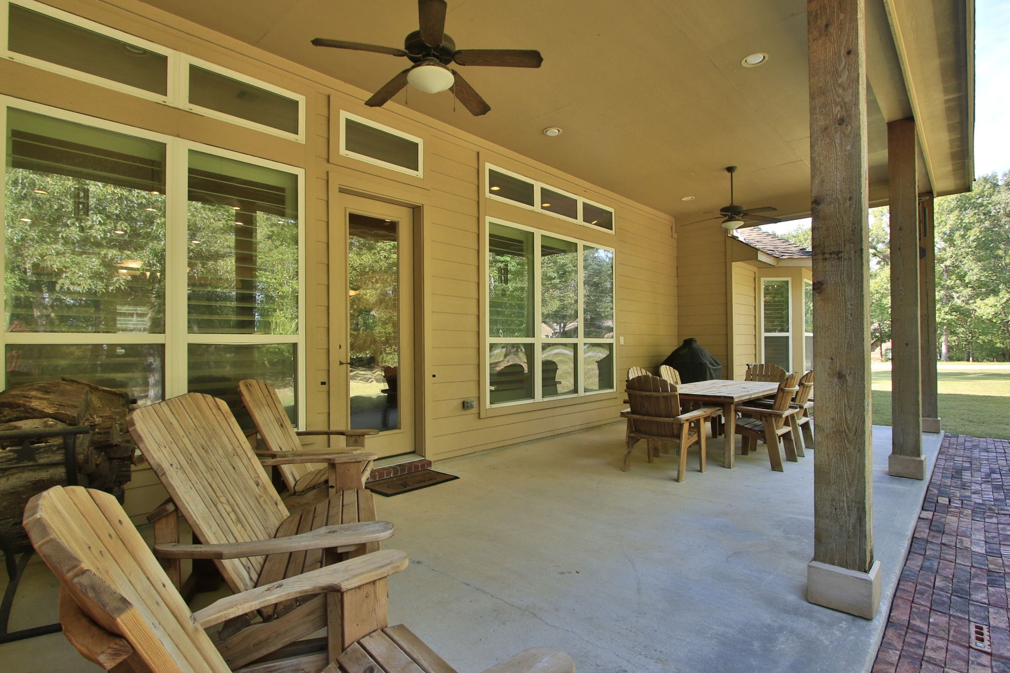 1547 Ruby Drive Willis, TX 77378 - Photo 37 of 48 a view of a patio with table and chairs