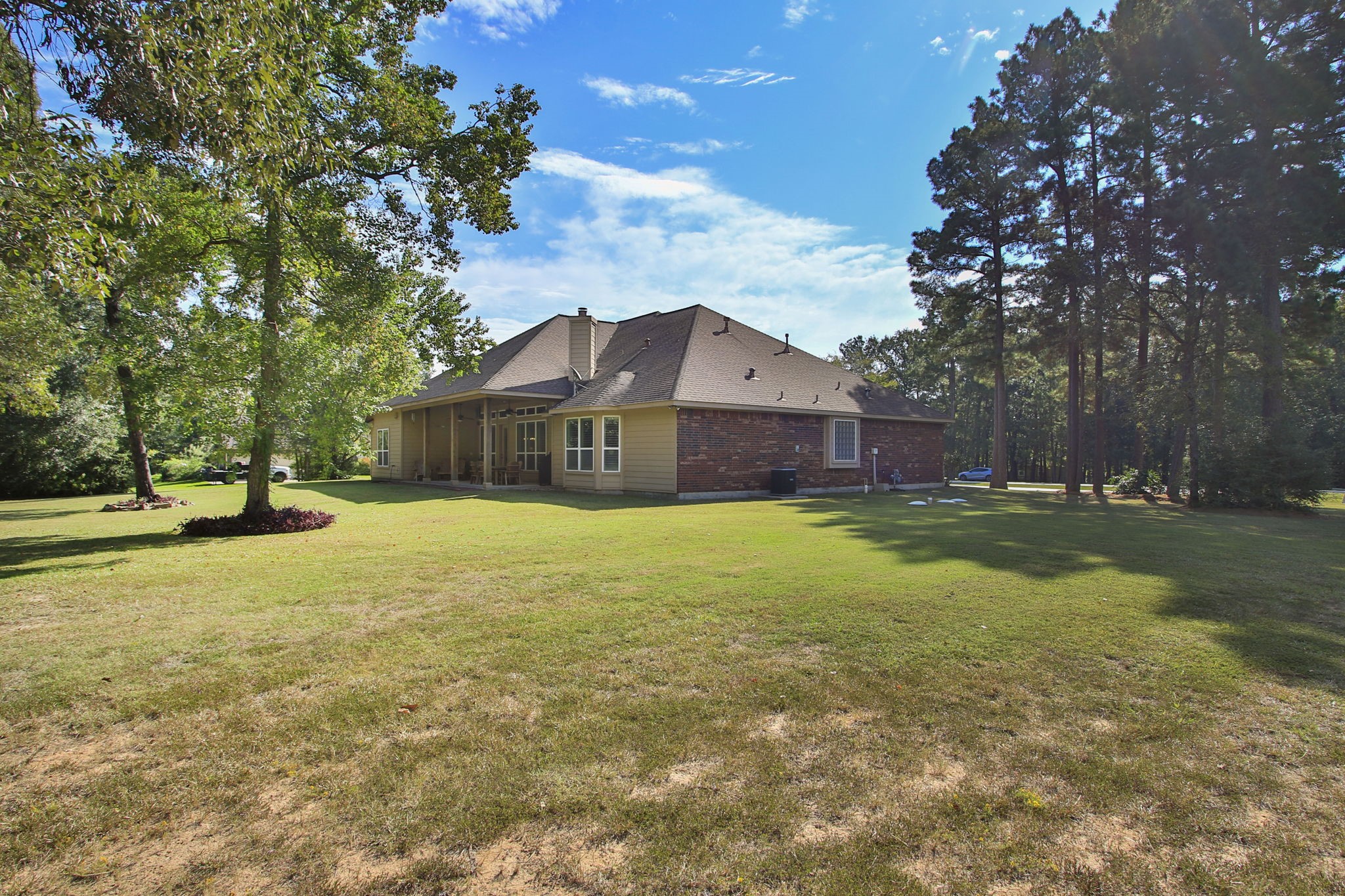 1547 Ruby Drive Willis, TX 77378 - Photo 40 of 48 a front view of a house with a yard