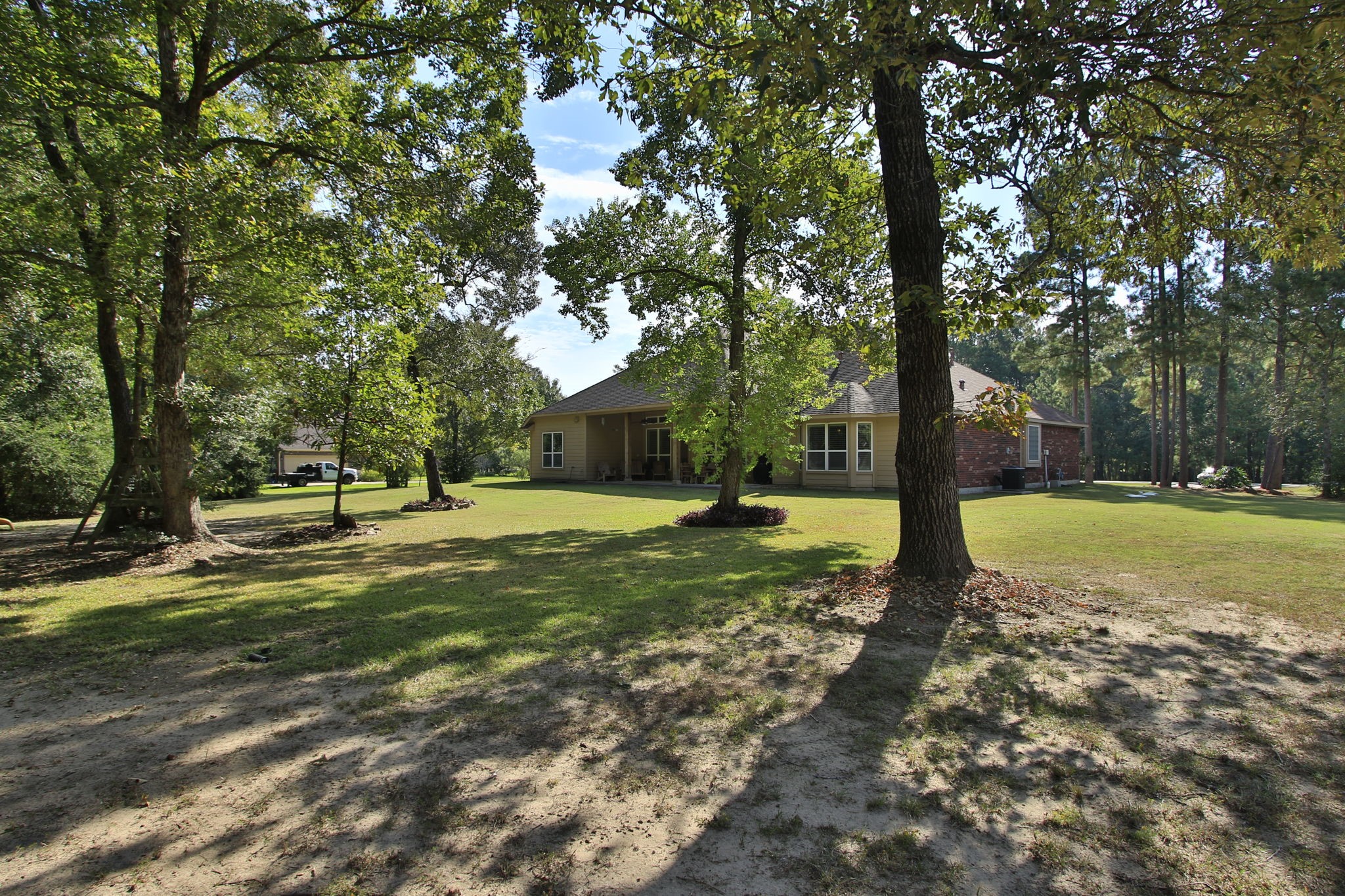 1547 Ruby Drive Willis, TX 77378 - Photo 41 of 48 a view of a house with a yard