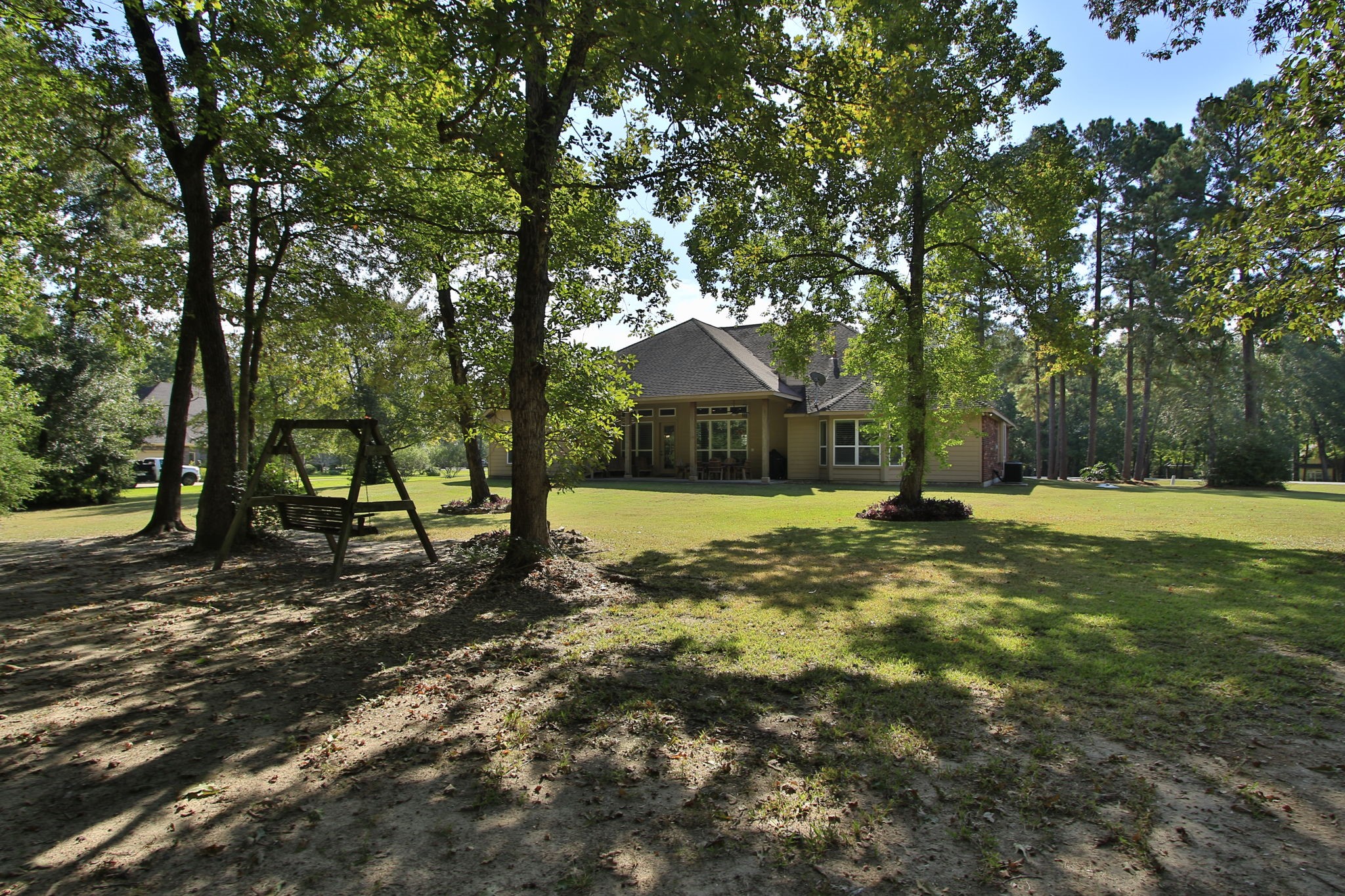 1547 Ruby Drive Willis, TX 77378 - Photo 42 of 48 a view of a house with a yard