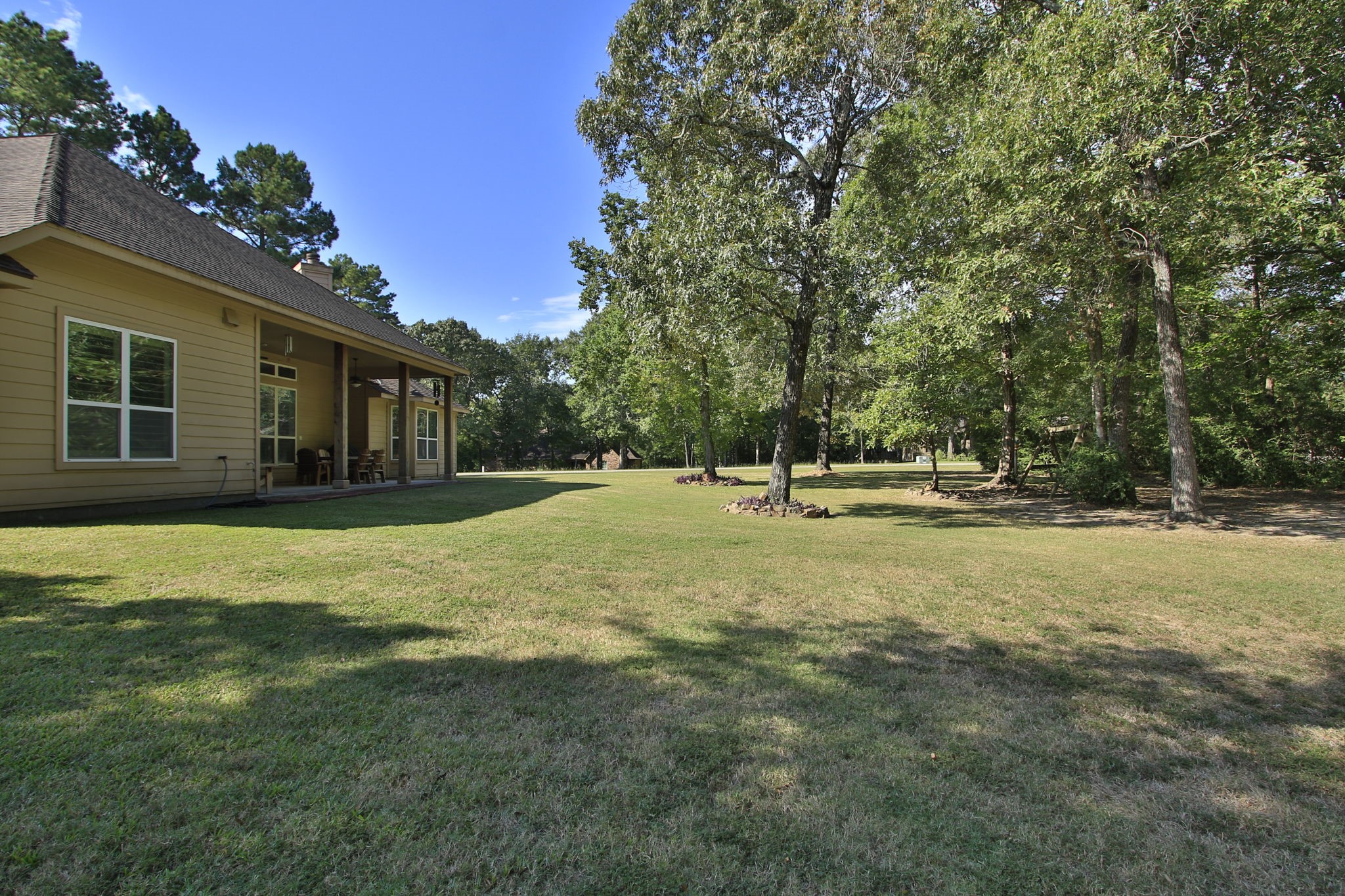 1547 Ruby Drive Willis, TX 77378 - Photo 44 of 48 a house with trees in the background