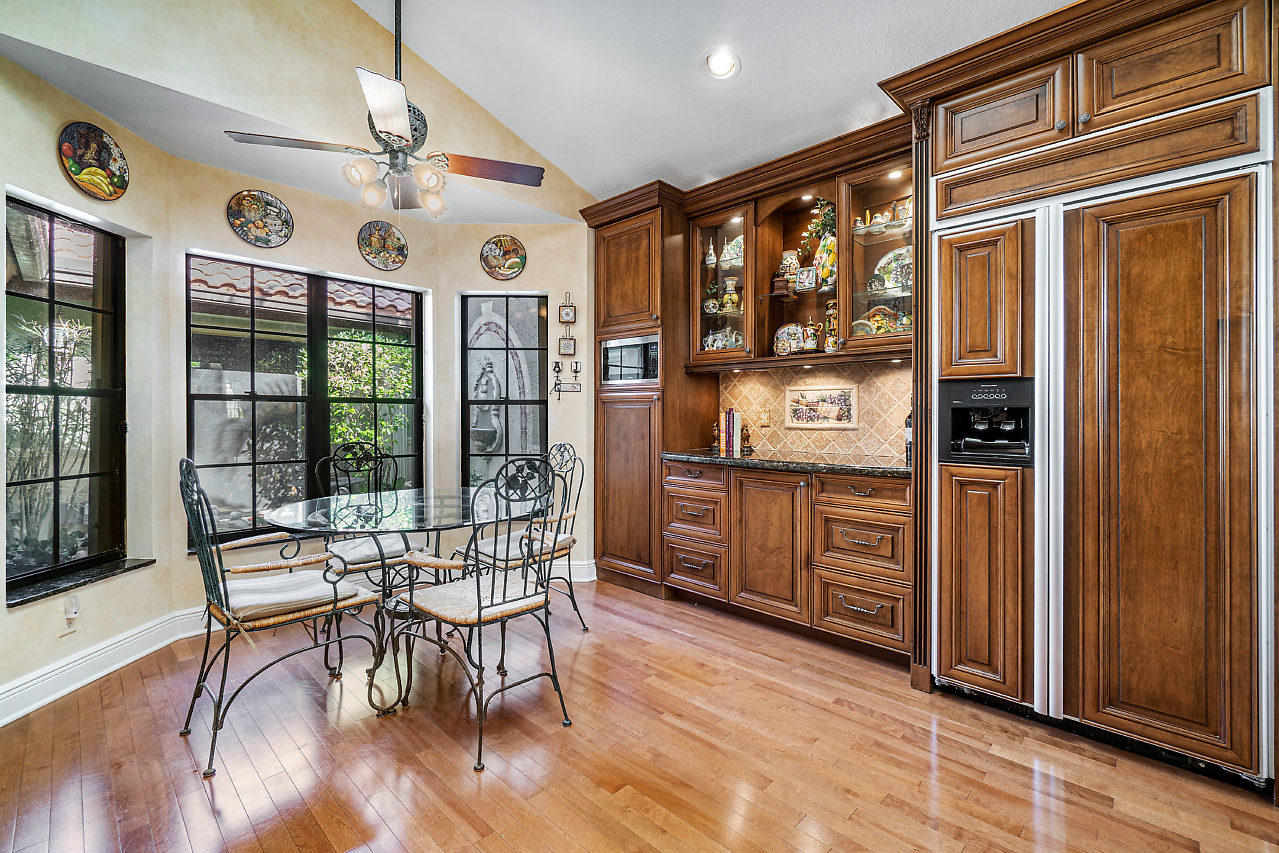 21772 Club Villa Terrace Boca Raton, FL 33433 - Photo 14 of 26 BREAKFAST AREA OVERLOOKS TROPICAL ATRIUM