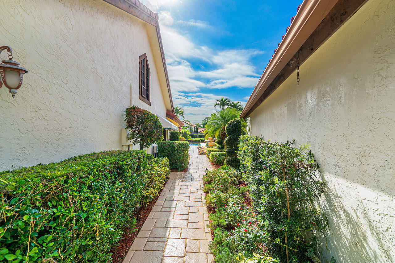 21772 Club Villa Terrace Boca Raton, FL 33433 - Photo 3 of 26 LUSHLY LANDSCAPED GATED COURTYARD ENTRY