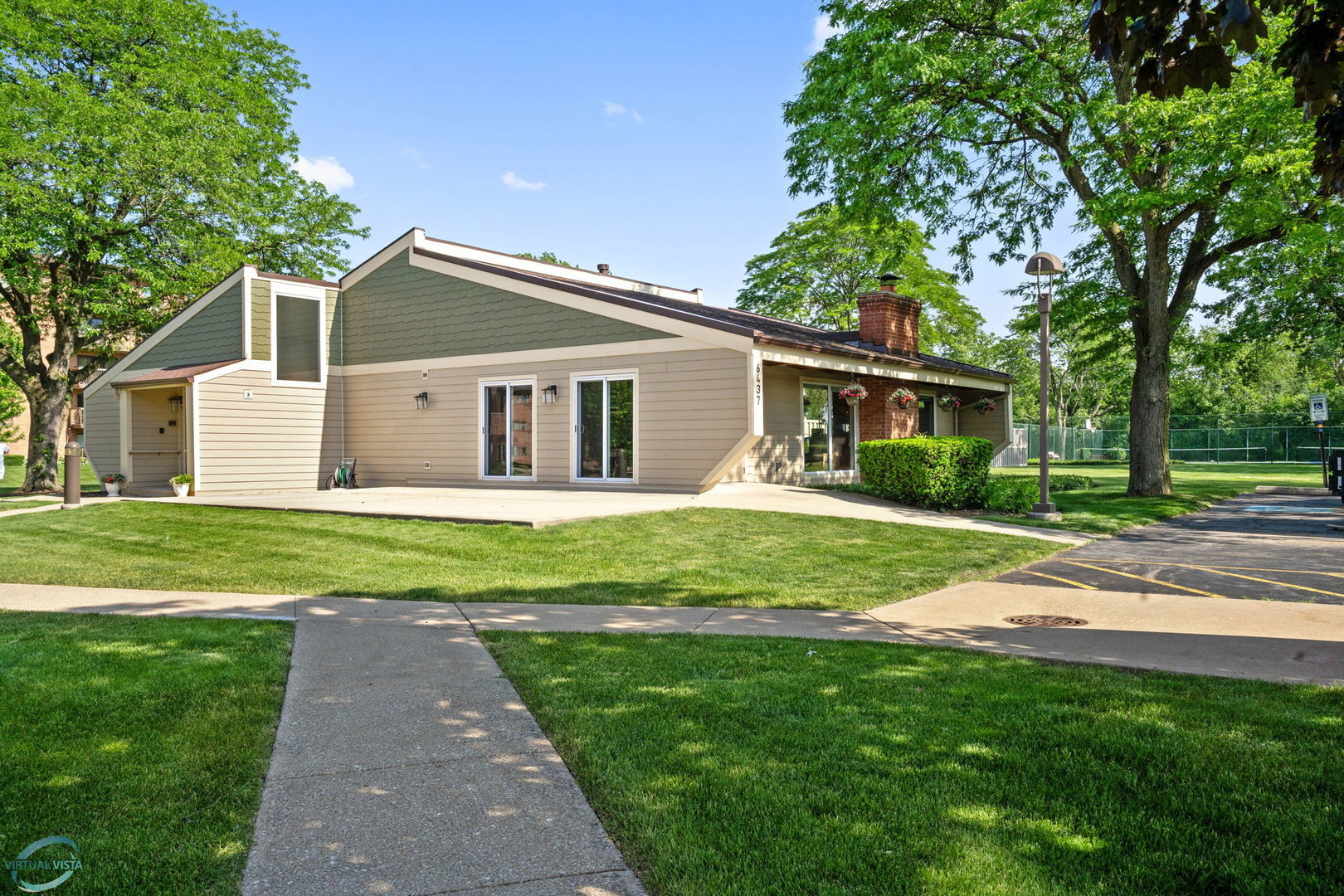 6401 Clarendon Hills Road, Unit 207 Willowbrook, IL 60527 - Photo 14 of 18 a front view of house with yard and green space