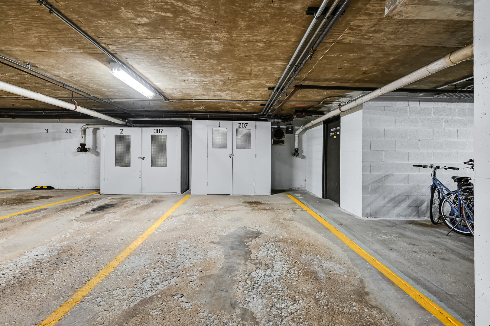 6401 Clarendon Hills Road, Unit 207 Willowbrook, IL 60527 - Photo 16 of 18 a view of a garage