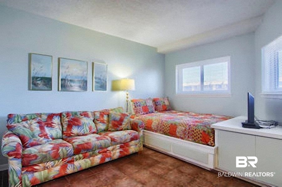 375 Plantation Road, Unit 5105 Gulf Shores, AL 36542 - Photo 5 of 9 Light blue wall paint complements the neutral ceiling