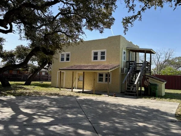 a view of a house with a patio