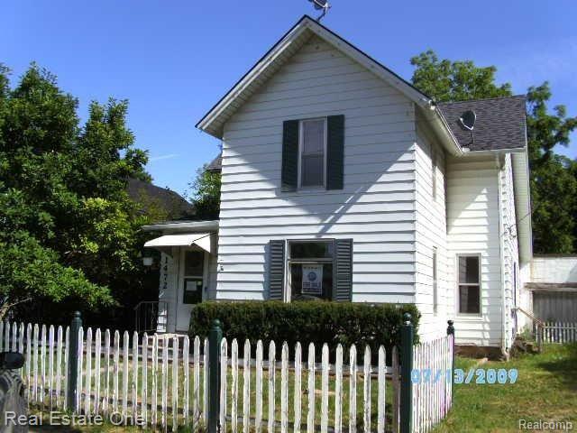 1472 West Cohoctah Road Brighton, MI 48116 - Photo 1 of 17 Front Elevation