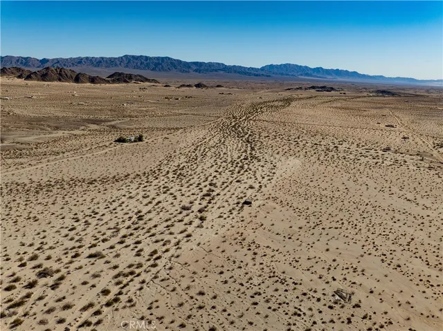 a view of ocean and mountain