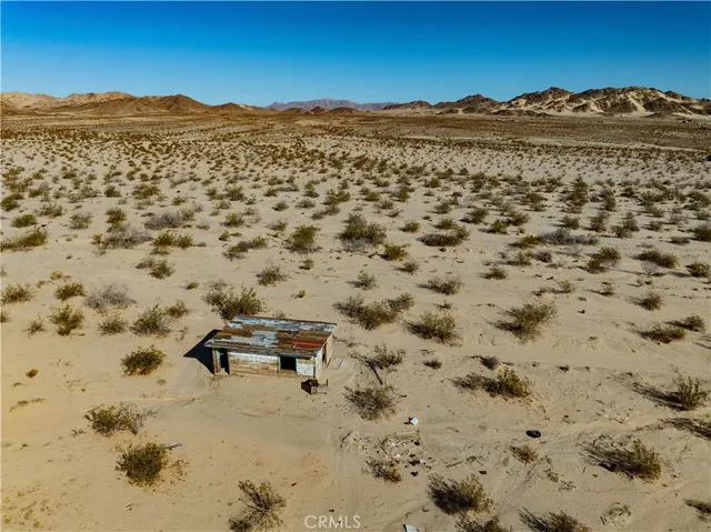 a view of a large body of water and mountain view