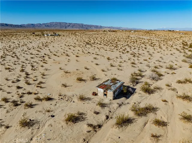 a view of an outdoor space and mountain view in back