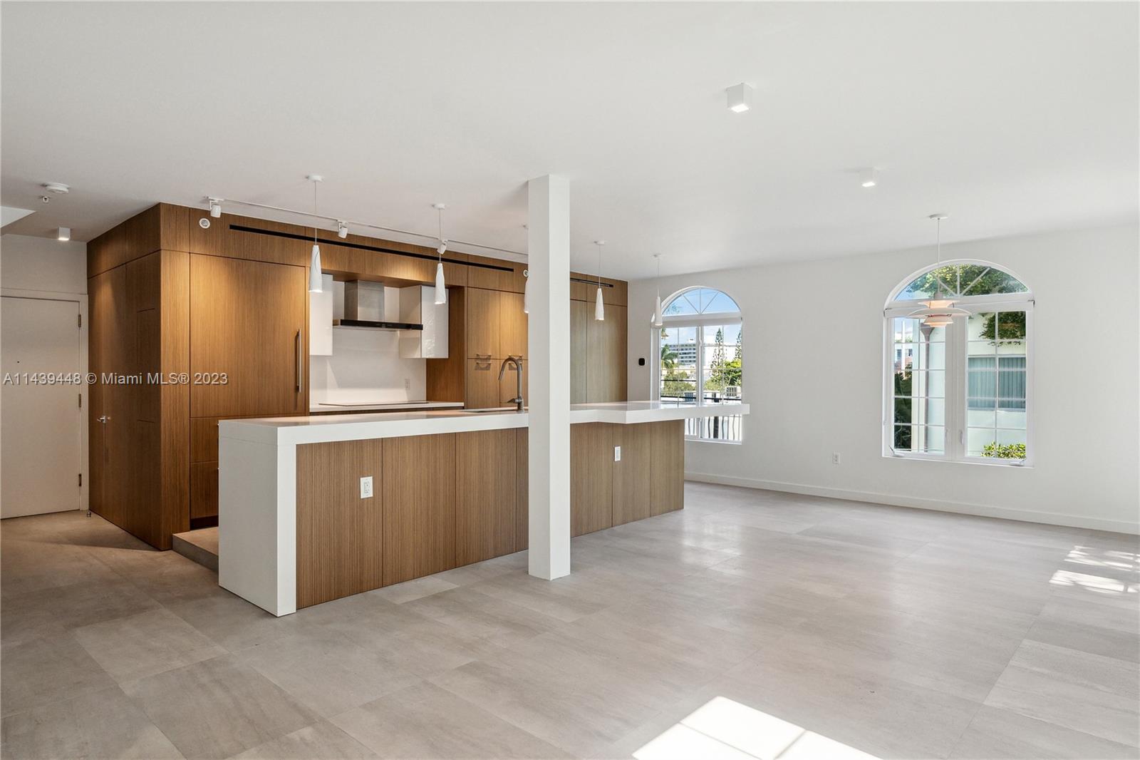 730 3rd Street, Unit 207 Miami Beach, FL 33139 - Photo 4 of 19 a view of a kitchen with a sink