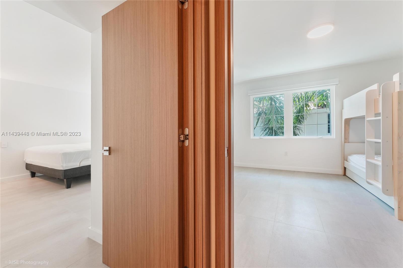 730 3rd Street, Unit 207 Miami Beach, FL 33139 - Photo 8 of 19 a view of an empty room and a window