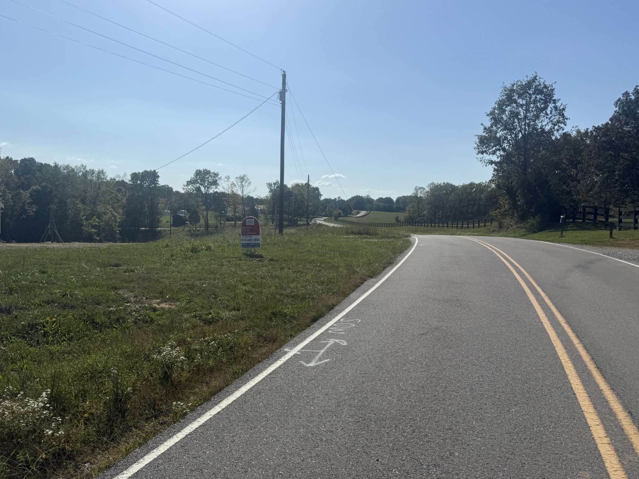 0 Old County House Road Charlotte, TN 37036 - Photo 14 of 20 a view of a green field with trees in the background