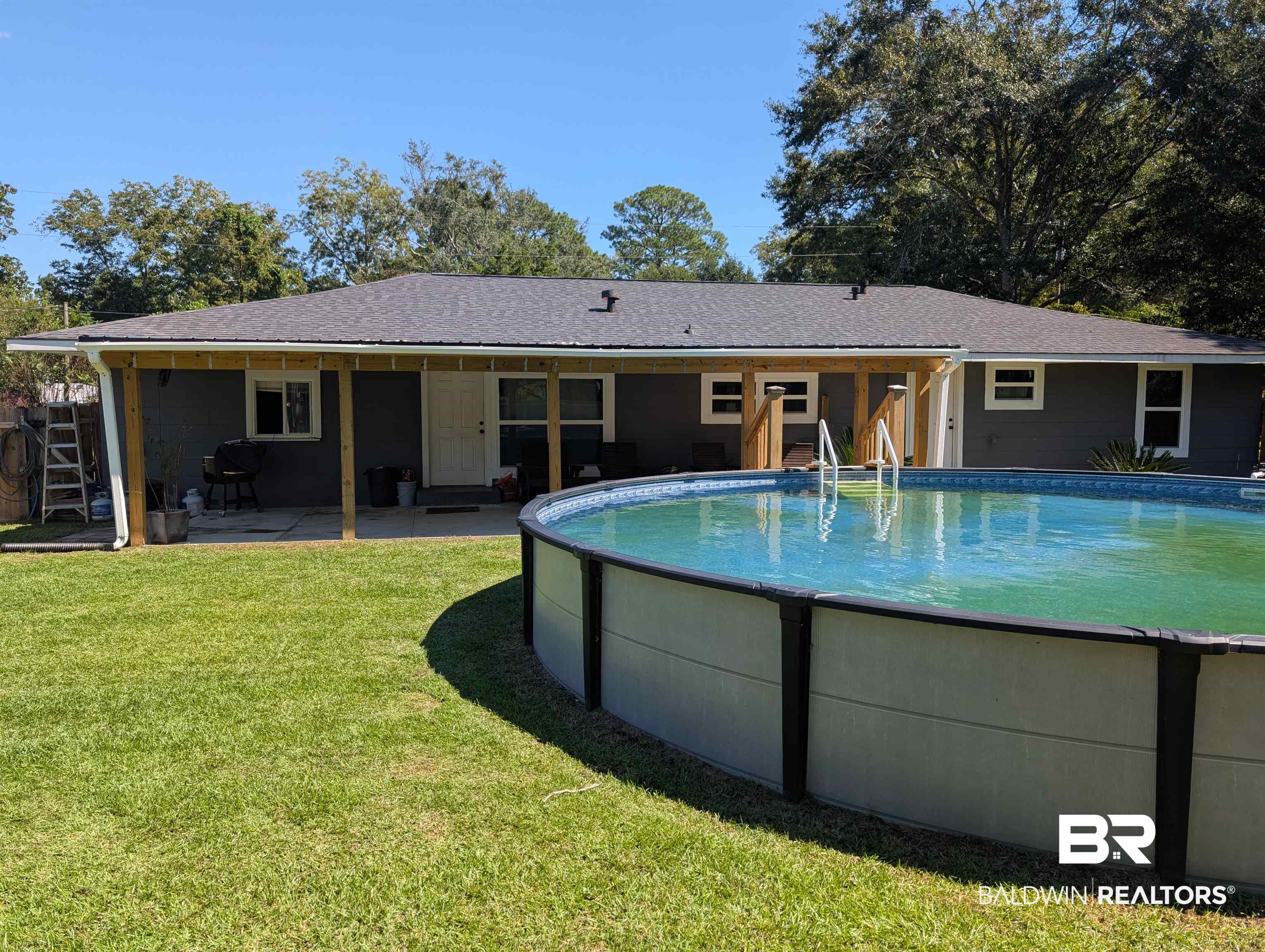 22103 2nd Street Silverhill, AL 36576 - Photo 4 of 10 View of pool with a patio and a yard