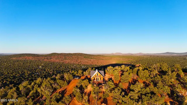 a view of mountain and an ocean