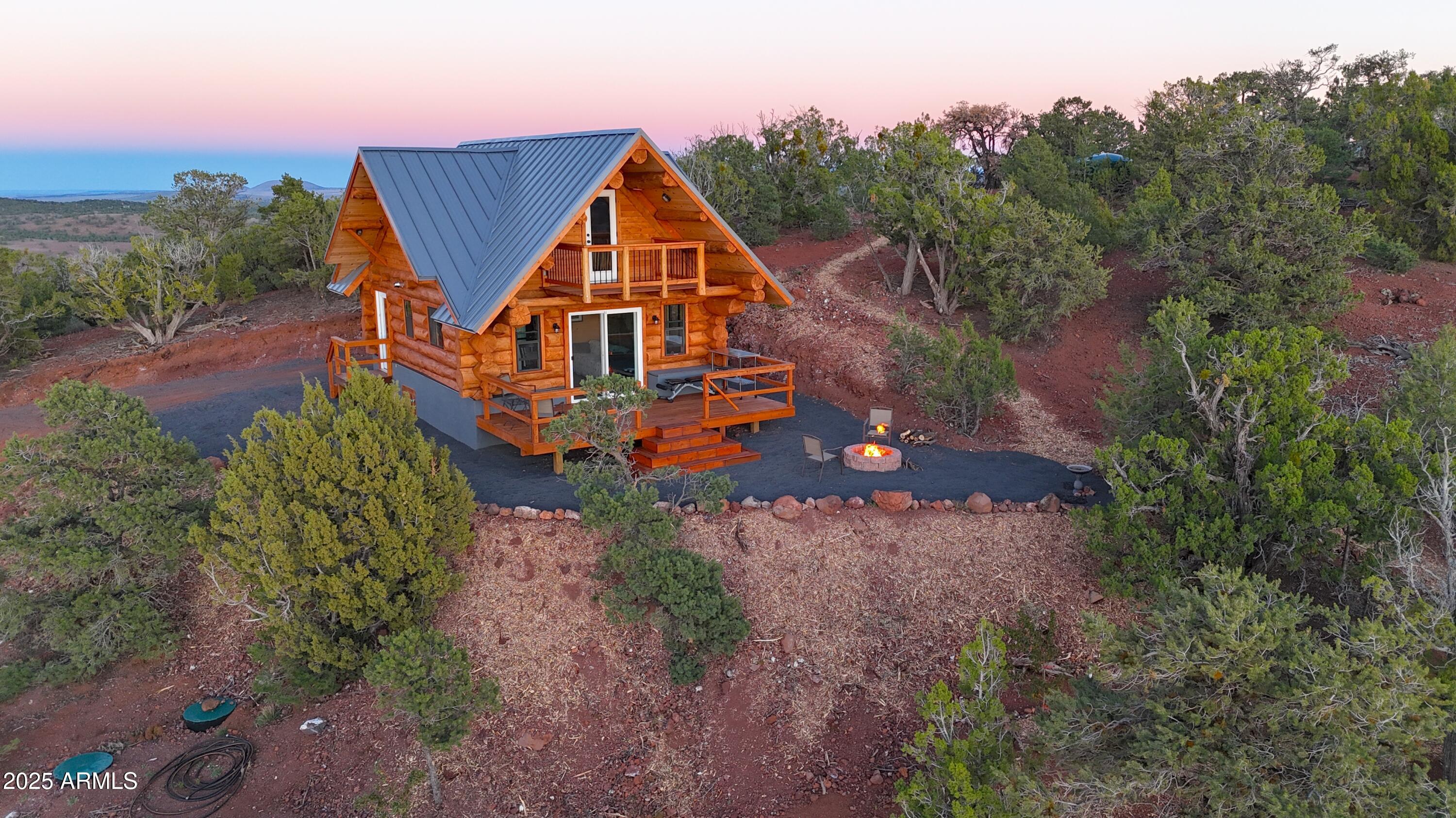 80 N3313 Show Low, AZ 85901 - Photo 12 of 50 an aerial view of a house with a yard