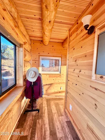 a view of a chairs with wooden floor
