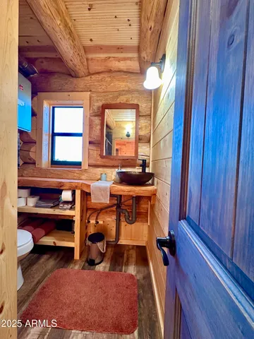 a view of a dining room with furniture and window