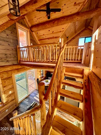 a view of a pathway with a wrought fence