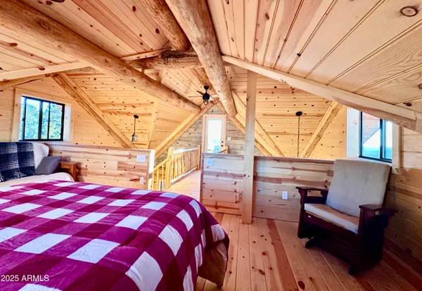 a view of balcony with wooden floor