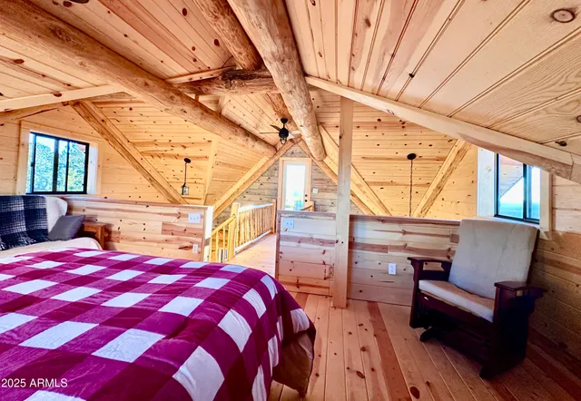 a view of balcony with wooden floor