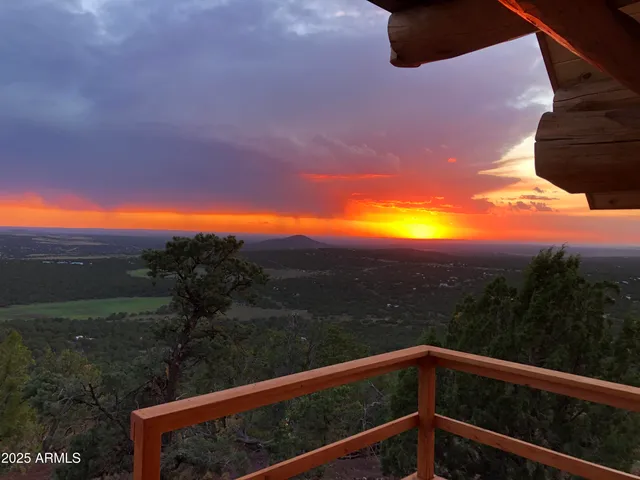 a view of a wooden fence