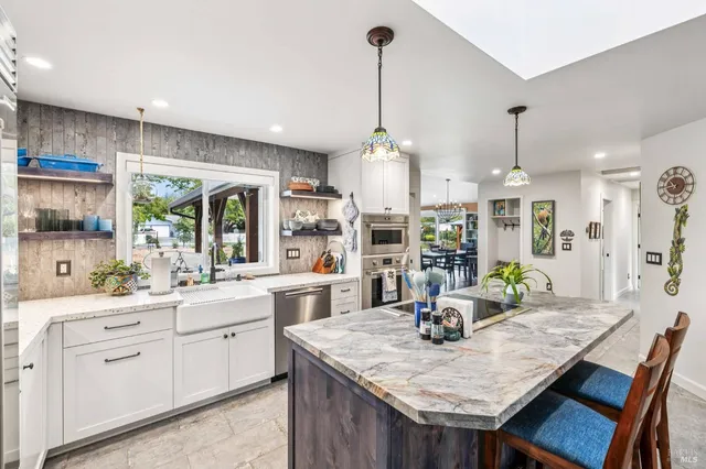 a view of kitchen with washer and dryer