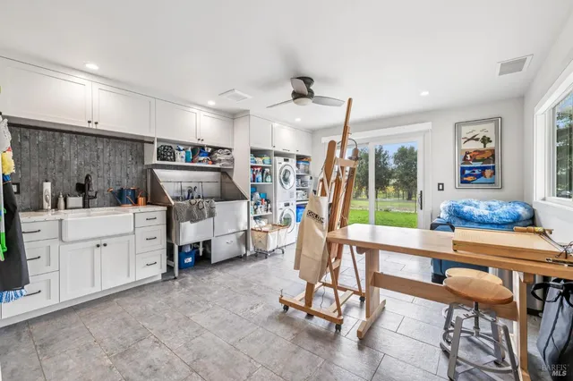 a bedroom with a large bed and a closet