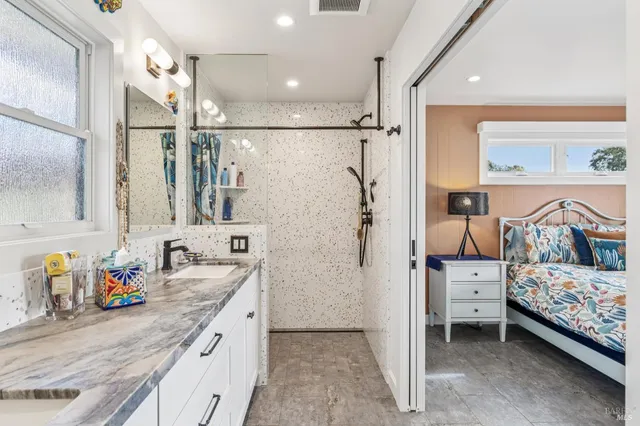 an outdoor space with furniture and umbrella