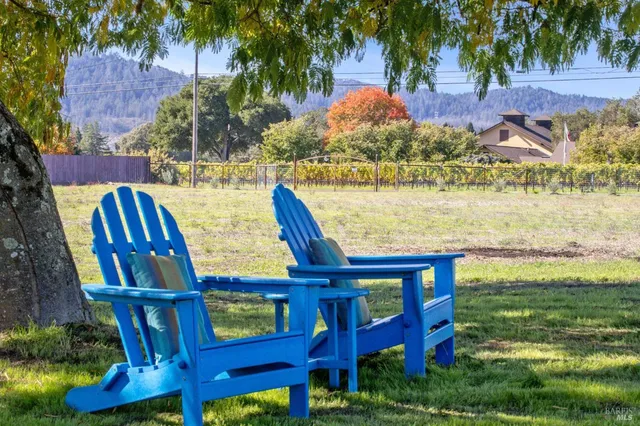 a picture of a room with table and chairs