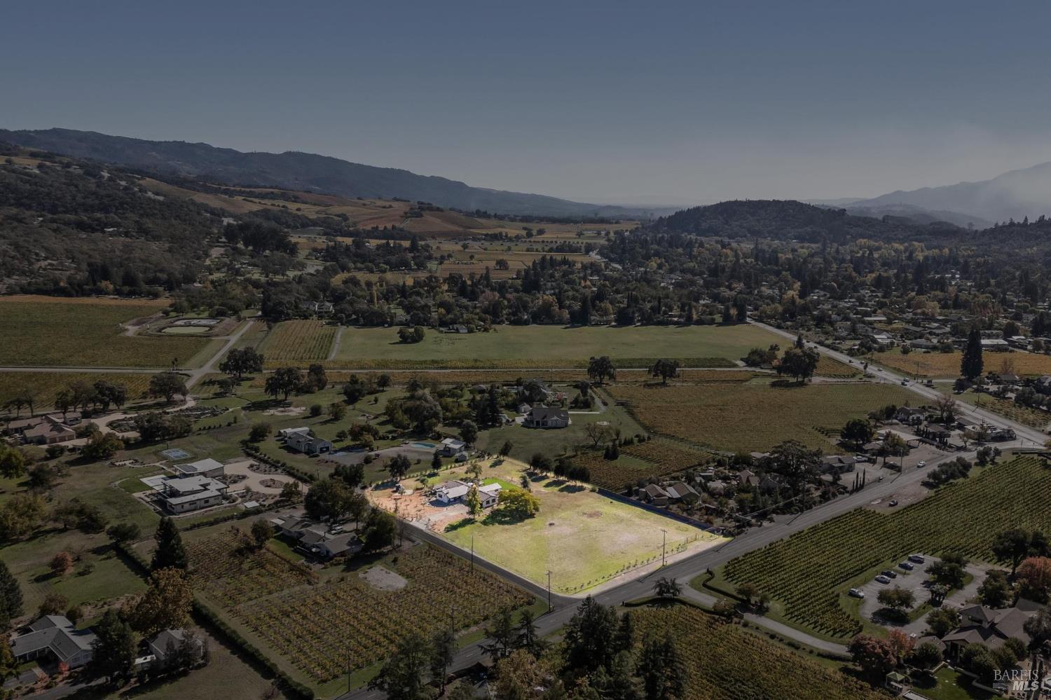 180 Adobe Canyon Road Kenwood, CA 95452 - Photo 56 of 61 an aerial view of residential house and lake view