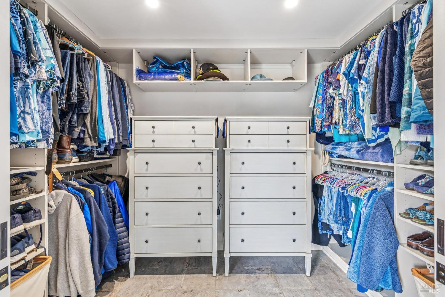 180 Adobe Canyon Road Kenwood, CA 95452 - Photo 61 of 61 a view of walk in closet with clothes and shoes