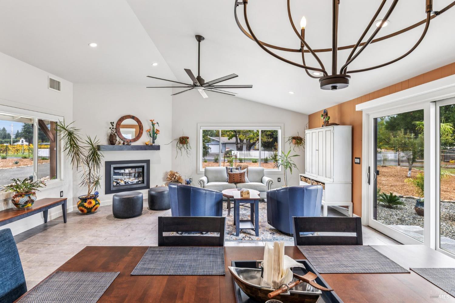 180 Adobe Canyon Road Kenwood, CA 95452 - Photo 9 of 61 a living room with furniture and a fireplace