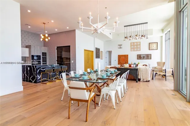 a view of a living room and dining room