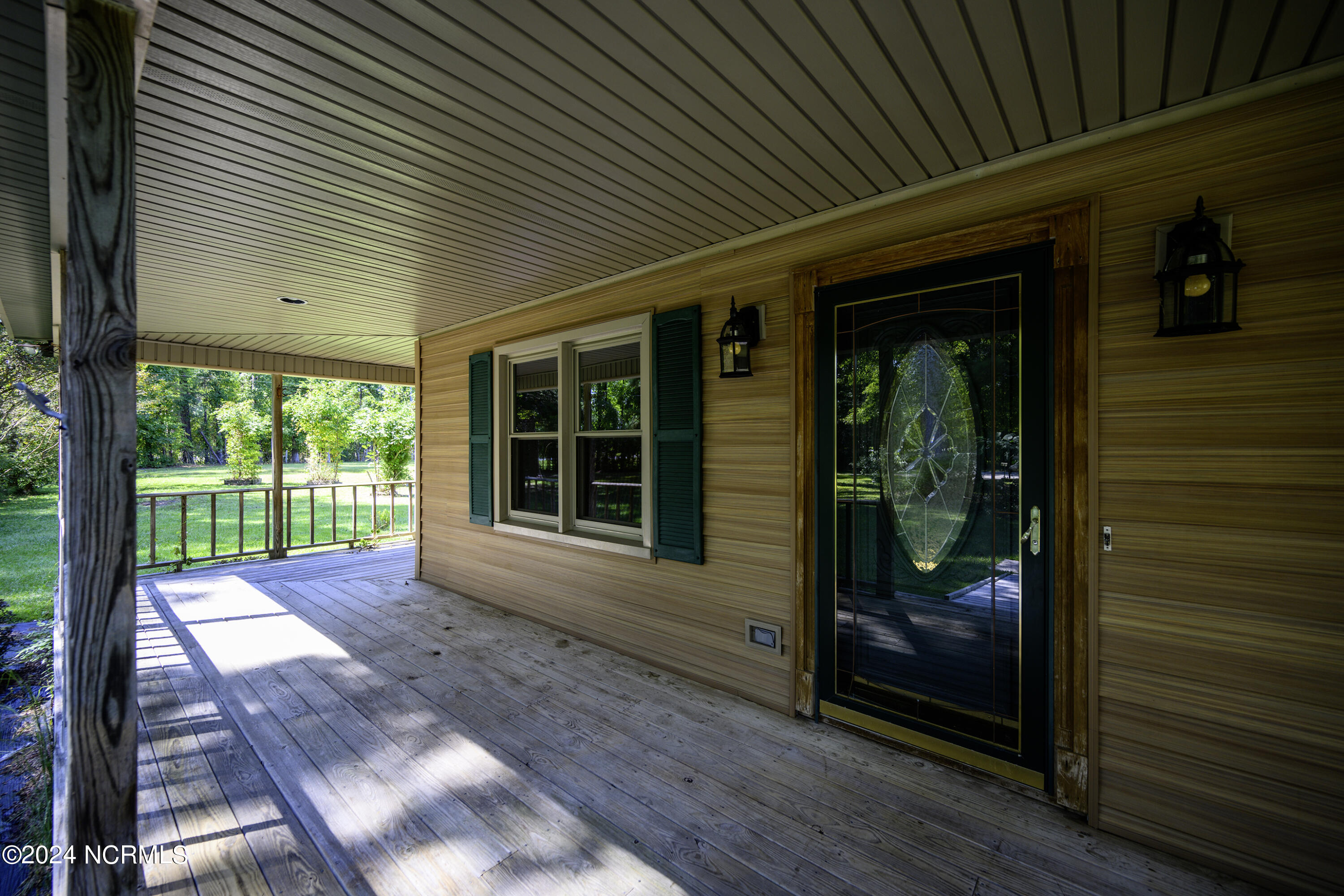 820 New Liberty Road New Bern, NC 28562 - Photo 6 of 73 Wrap Around Rocking Chair Front Porch