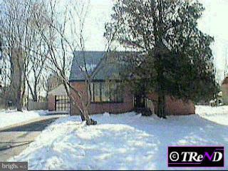 12043 Sewell Road Philadelphia, PA 19116 - Photo 1 of 1 a view of yard covered with snow in front of house