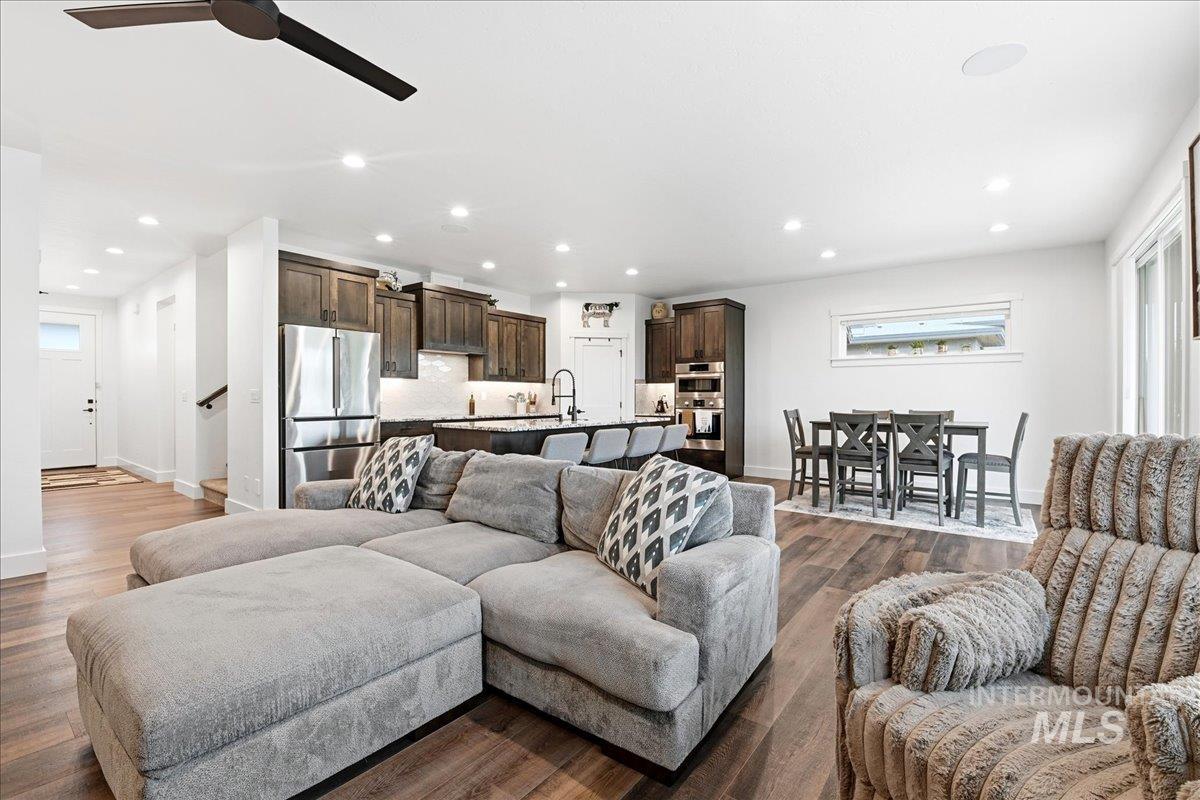 13152 Hawks Bay Road Donnelly, ID 83615 - Photo 6 of 29 Open-concept living space featuring wood-finish flooring, recessed lighting, and a contemporary ceiling fan