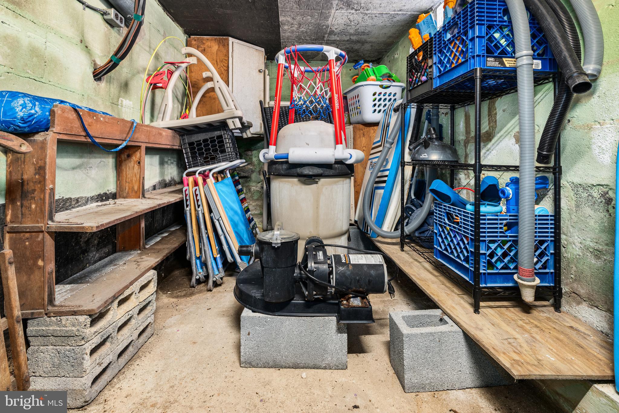 8109 Woodhaven Road Baltimore, MD 21237 - Photo 24 of 40 Enclosed storage space under side porch