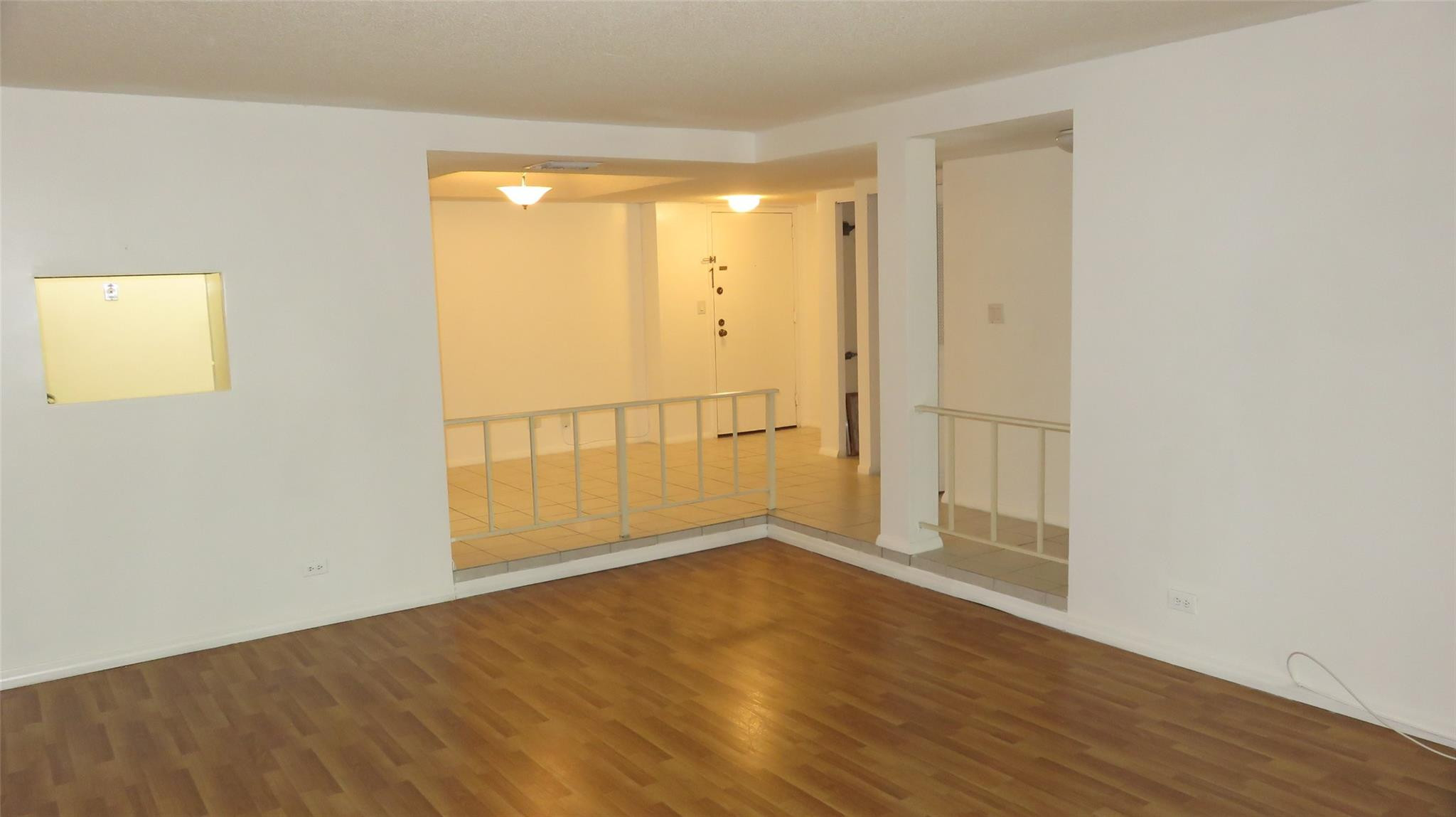 3720 Inverrary Drive, Unit 2C Lauderhill, FL 33319 - Photo 12 of 42 wooden floor in an empty room