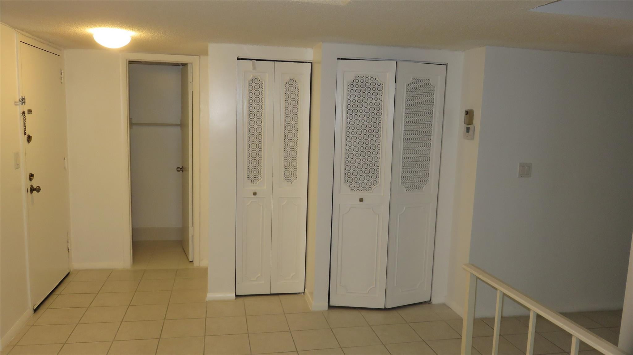3720 Inverrary Drive, Unit 2C Lauderhill, FL 33319 - Photo 15 of 42 a view of a hallway with closet area