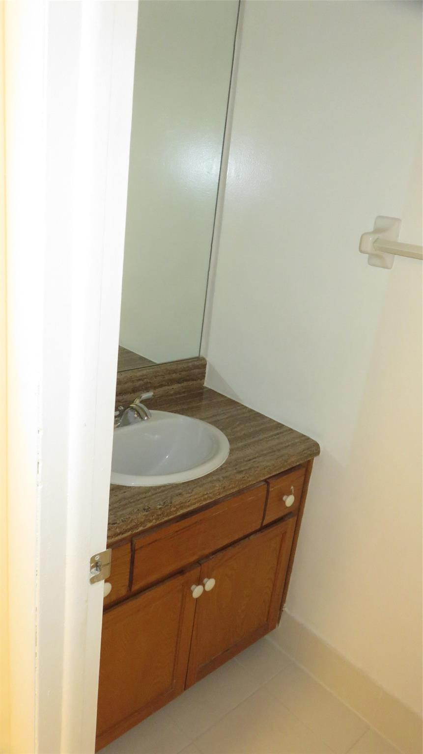 3720 Inverrary Drive, Unit 2C Lauderhill, FL 33319 - Photo 16 of 42 a view of cupboard