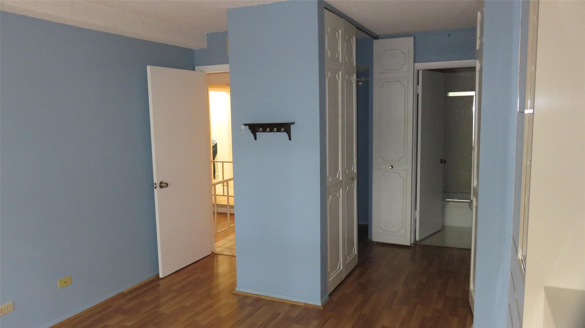 3720 Inverrary Drive, Unit 2C Lauderhill, FL 33319 - Photo 18 of 42 a view of a hallway with wooden floor